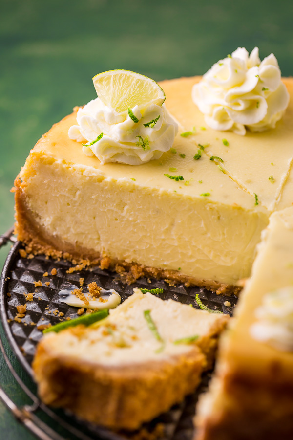 This Key Lime Cheesecake is so creamy and always a crowd-pleaser! The base is a graham cracker crust and the cheesecake filling is made with lime juice and lime zest, which provides plenty of lime flavor. If you love key lime pie and cheesecake, you have to try this great recipe!