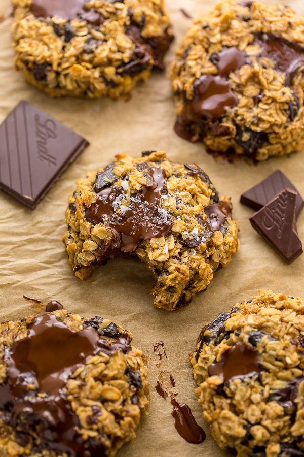 These Gluten Free Oatmeal Cookies are soft yet crunchy and loaded with gooey chocolate! Made with gluten free oats, almond flour, and shredded coconut, these cookies are completely gluten free. So delicious with a glass of milk!