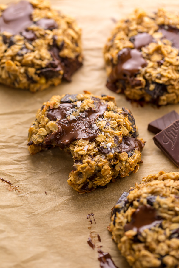 These Gluten Free Oatmeal Cookies are soft yet crunchy and loaded with gooey chocolate! Made with gluten free oats, almond flour, and shredded coconut, these cookies are completely gluten free. So delicious with a glass of milk!