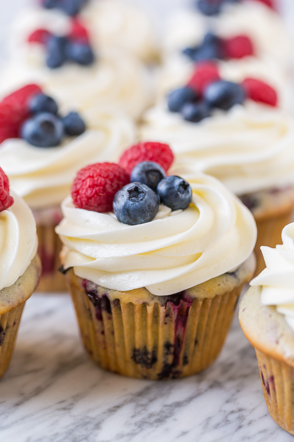 These Red, White and Blueberry Cupcakes are light, fluffy, and so festive! Perfect for patriotic holidays like Memorial Day, the Fourth of July and Labor Day!