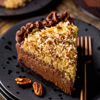 This No-Bake German Chocolate Cheesecake is insanely decadent and such a treat! Featuring a crunchy Oreo cookie crust, creamy chocolate cheesecake filling, and coconut and pecan topping... it's a total showstopper! Bonus: You can make this up to 4 days in advance!