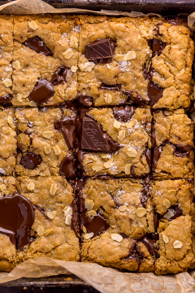 These are the BEST Oatmeal Cookie Bars you'll ever bake! Soft, chewy, and loaded with rolled oats and chocolate, this is a great recipe the whole family will love! Super easy and no mixer required!