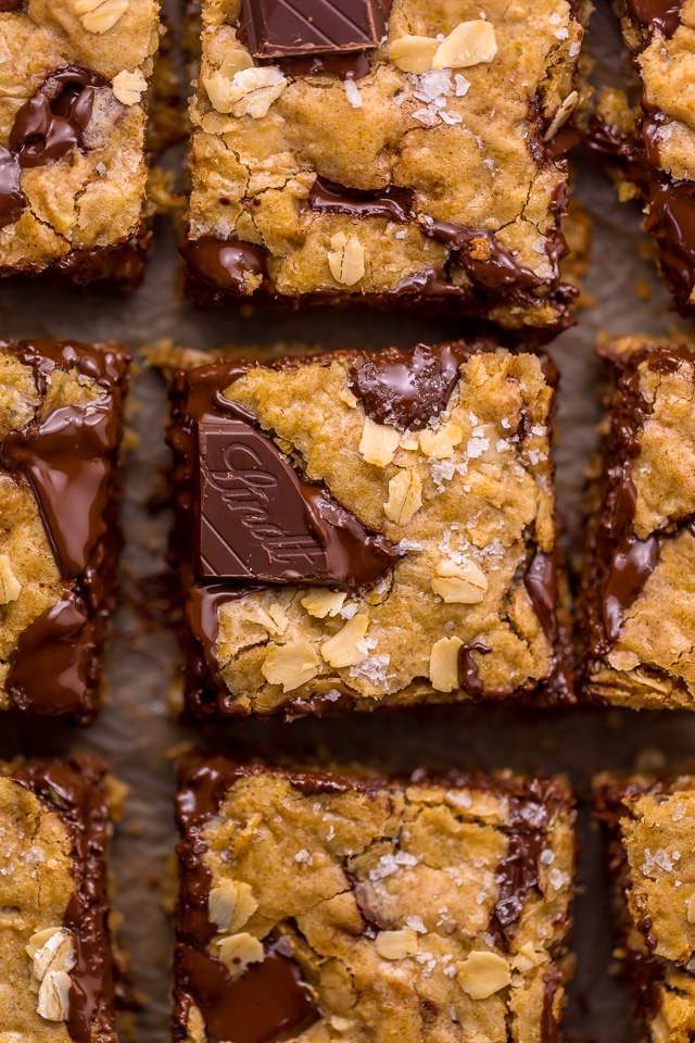 These are the BEST Oatmeal Cookie Bars you'll ever bake! Soft, chewy, and loaded with rolled oats and chocolate, this is a great recipe the whole family will love! Super easy and no mixer required!