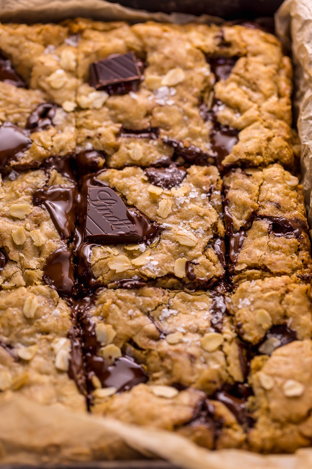 These are the BEST Oatmeal Cookie Bars you'll ever bake! Soft, chewy, and loaded with rolled oats and chocolate, this is a great recipe the whole family will love! Super easy and no mixer required!