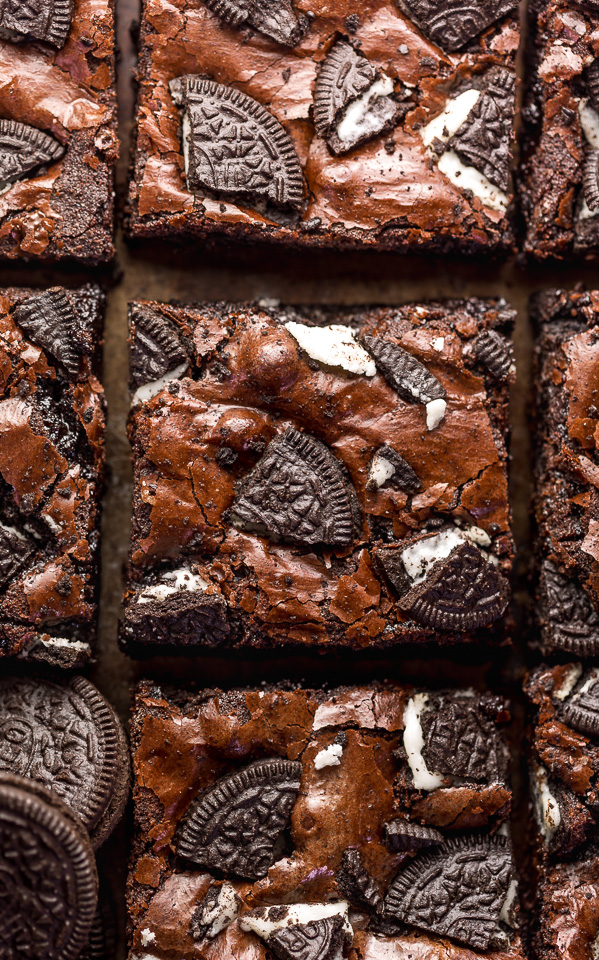 Oreo Brownies are so easy and a MILLION times more delicious than boxed brownie mix! Loaded with rich chocolate flavor, chocolate chips, and plenty of crushed Oreo cookies! Preheat your oven to 350 and bake these brownies today!