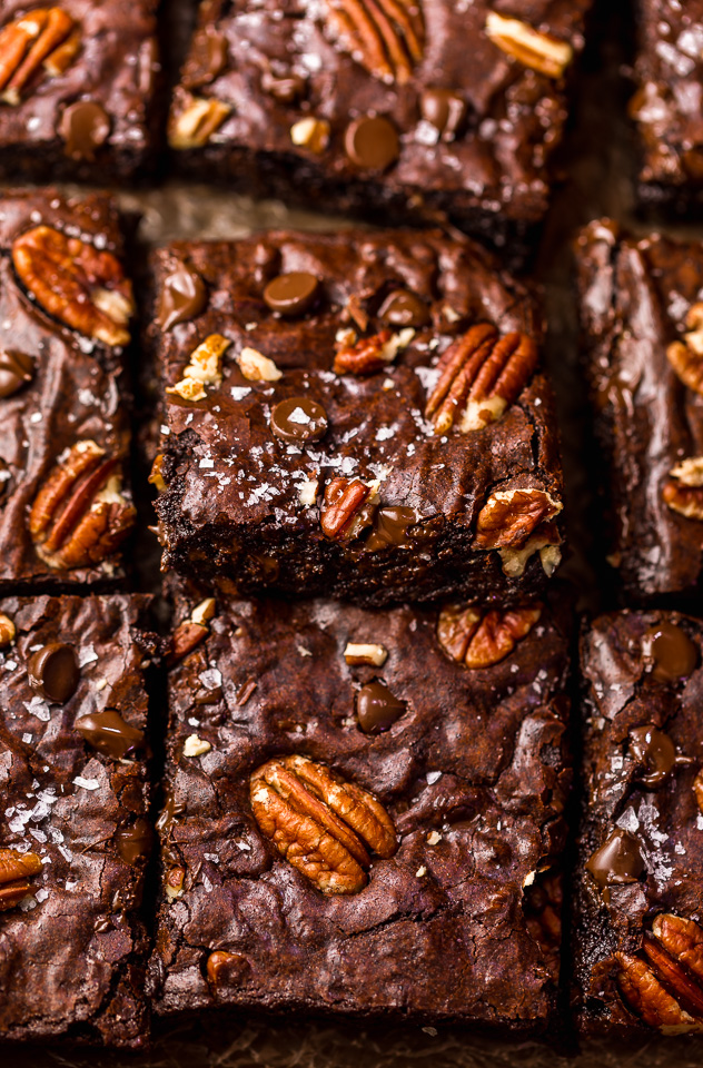 These Bourbon Pecan Brownies are going to blow your mind! They're thick, insanely chewy, and loaded with crunchy pecans, a pinch of cinnamon, and flavorful bourbon! The ultimate special occasion brownie recipe!