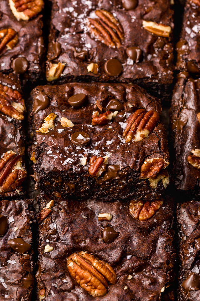 These Bourbon Pecan Brownies are going to blow your mind! They're thick, insanely chewy, and loaded with crunchy pecans, a pinch of cinnamon, and flavorful bourbon! The ultimate special occasion brownie recipe!