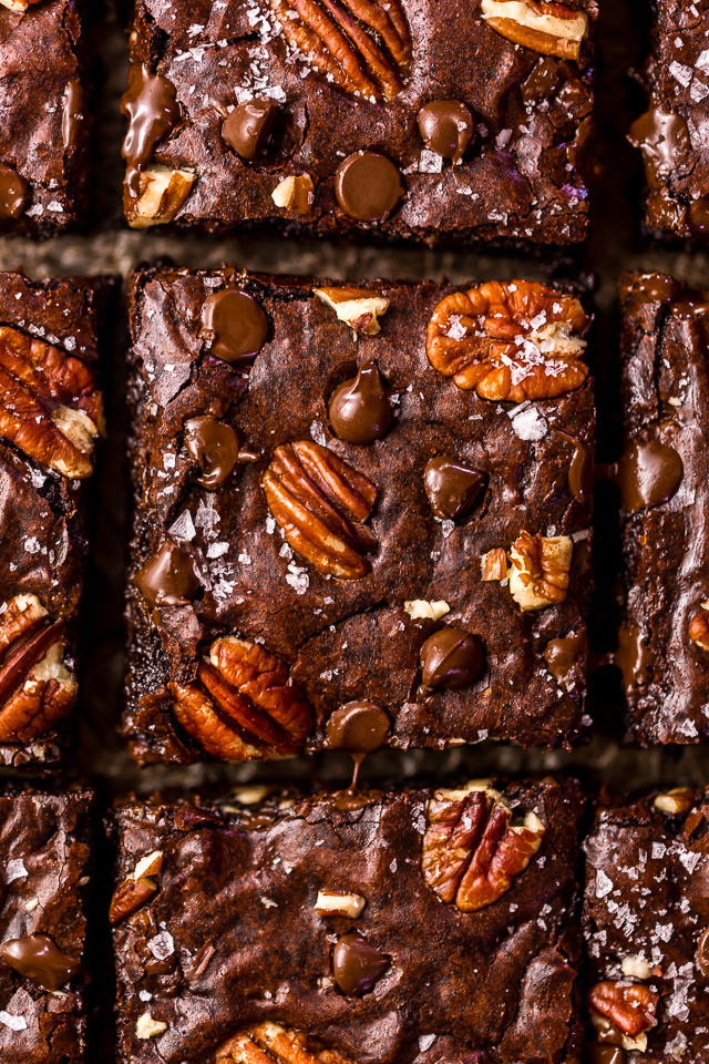 These Bourbon Pecan Brownies are going to blow your mind! They're thick, insanely chewy, and loaded with crunchy pecans, a pinch of cinnamon, and flavorful bourbon! The ultimate special occasion brownie recipe!