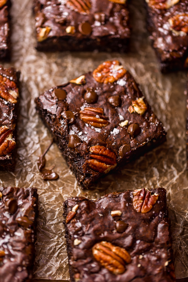 These Bourbon Pecan Brownies are going to blow your mind! They're thick, insanely chewy, and loaded with crunchy pecans, a pinch of cinnamon, and flavorful bourbon! The ultimate special occasion brownie recipe!