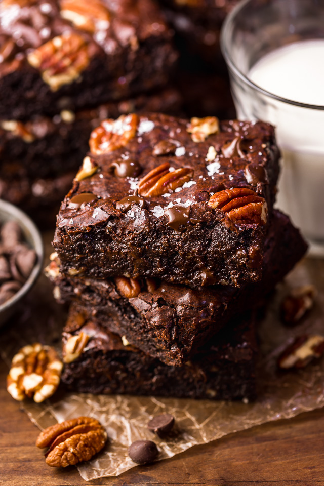 These Bourbon Pecan Brownies are going to blow your mind! They're thick, insanely chewy, and loaded with crunchy pecans, a pinch of cinnamon, and flavorful bourbon! The ultimate special occasion brownie recipe!