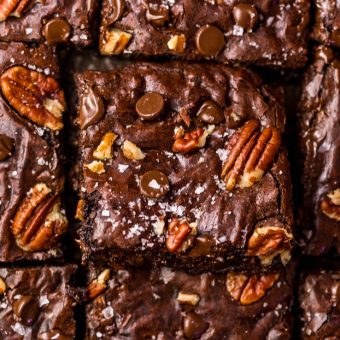 These Bourbon Pecan Brownies are going to blow your mind! They're thick, insanely chewy, and loaded with crunchy pecans, a pinch of cinnamon, and flavorful bourbon! The ultimate special occasion brownie recipe!