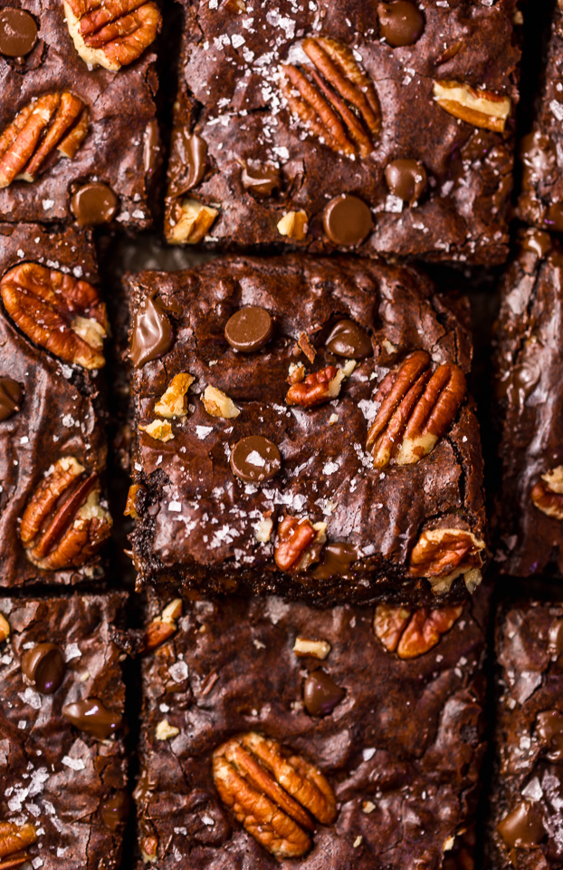 These Bourbon Pecan Brownies are going to blow your mind! They're thick, insanely chewy, and loaded with crunchy pecans, a pinch of cinnamon, and flavorful bourbon! The ultimate special occasion brownie recipe!