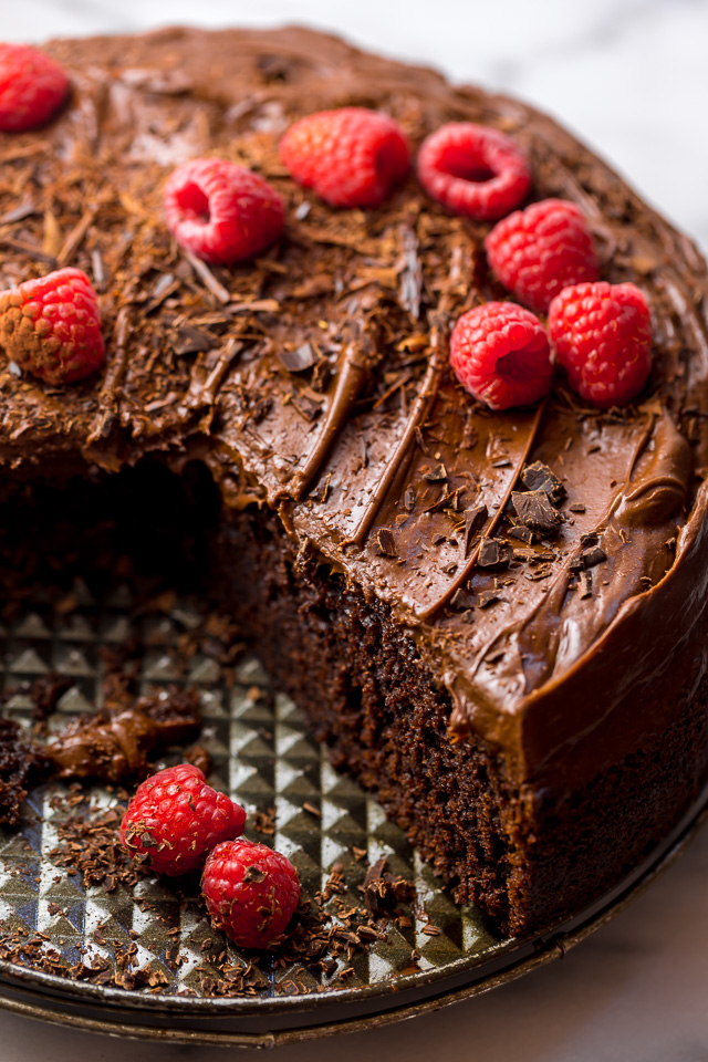 This Easy Single Layer Chocolate Cake is utterly moist and topped with melt-in-your-mouth Chocolate Frosting! The perfect dessert for date night in, small birthday celebrations, and intimate gatherings. And no electric mixer required!