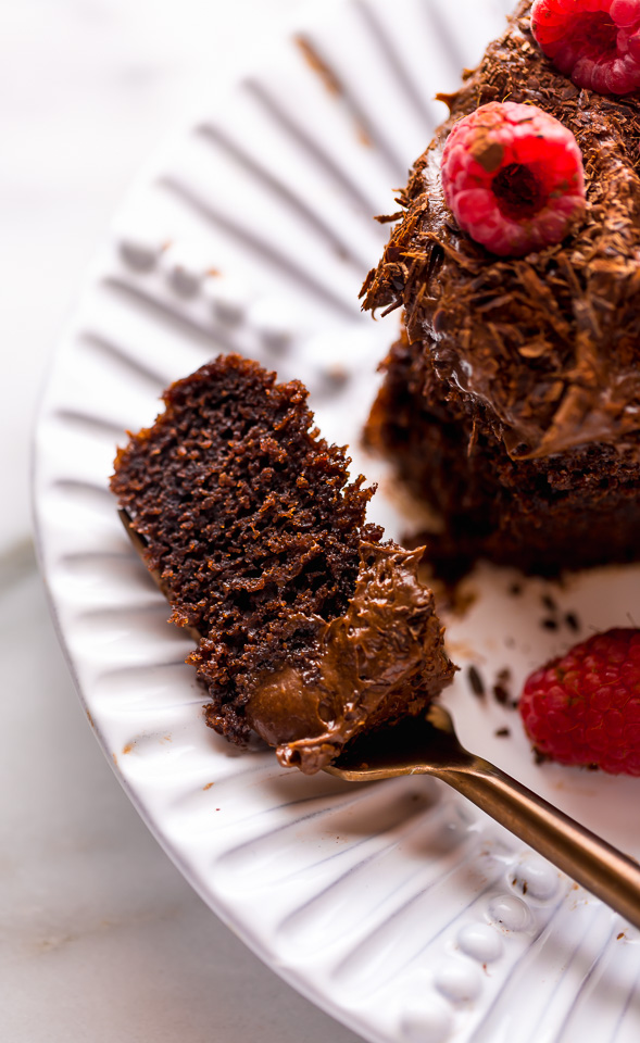 This Easy Single Layer Chocolate Cake is utterly moist and topped with melt-in-your-mouth Chocolate Frosting! The perfect dessert for date night in, small birthday celebrations, and intimate gatherings. And no electric mixer required!