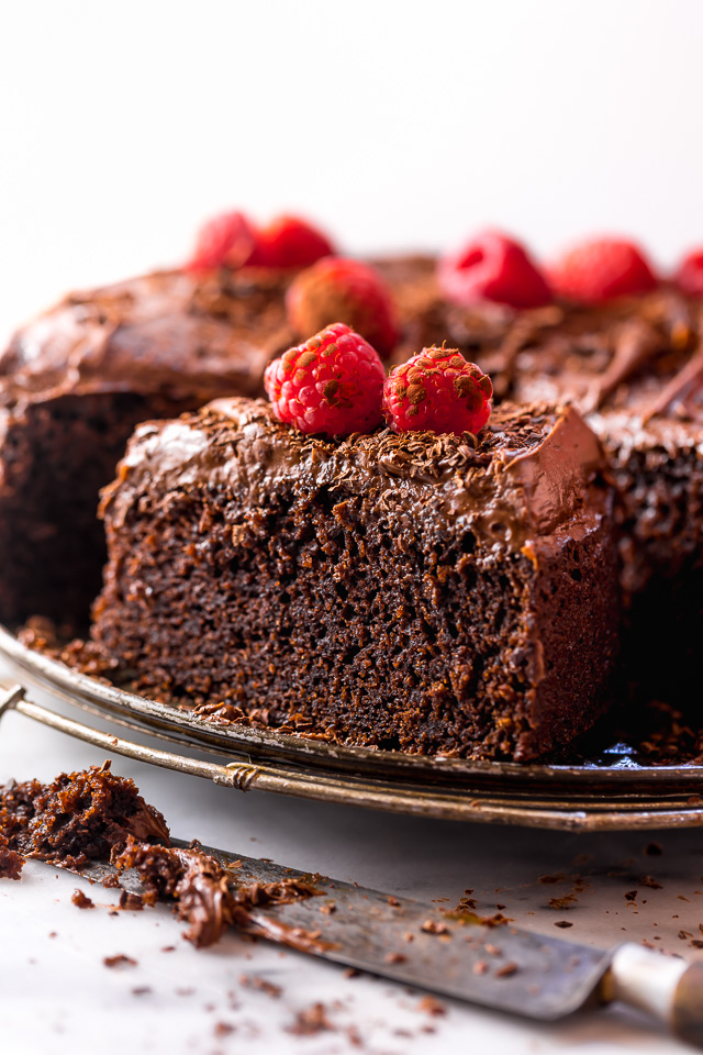 This Easy Single Layer Chocolate Cake is utterly moist and topped with melt-in-your-mouth Chocolate Frosting! The perfect dessert for date night in, small birthday celebrations, and intimate gatherings. And no electric mixer required!