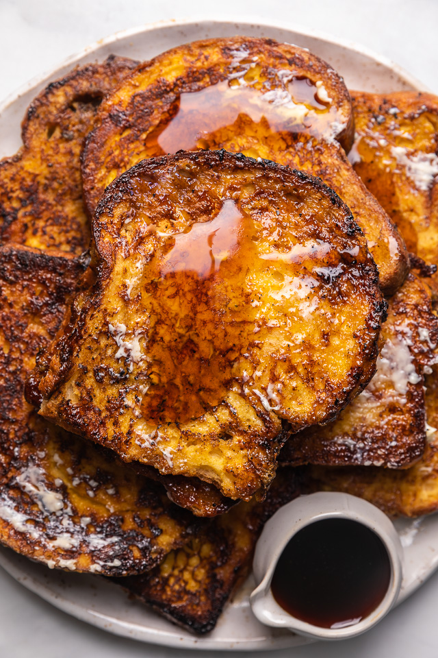 Today I'm teaching you how to make the BEST Easy French Toast! And you won't believe how quick and easy it is! Topped with maple syrup, this French toast recipe is sure to become one of your favorite breakfasts!