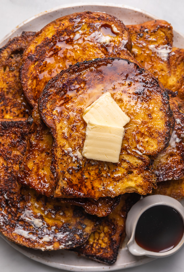 Today I'm teaching you how to make the BEST Easy French Toast! And you won't believe how quick and easy it is! Topped with maple syrup, this French toast recipe is sure to become one of your favorite breakfasts!