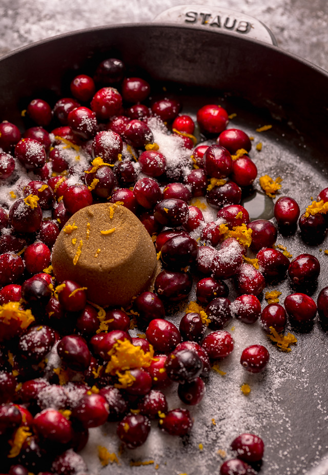 Rustic Cranberry Hand Pies feature a flaky crust and a delicious orange cranberry filling! And their petite handheld size makes them perfect for sharing this holiday season! It's just not Christmas in our house without these on the table!