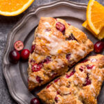 Cranberry Orange Scones are loaded with vibrant orange flavor, fresh cranberries, and topped with a sweet orange glaze! Perfect for breakfast or brunch! And one of my favorite scone recipes to make during the holiday season!