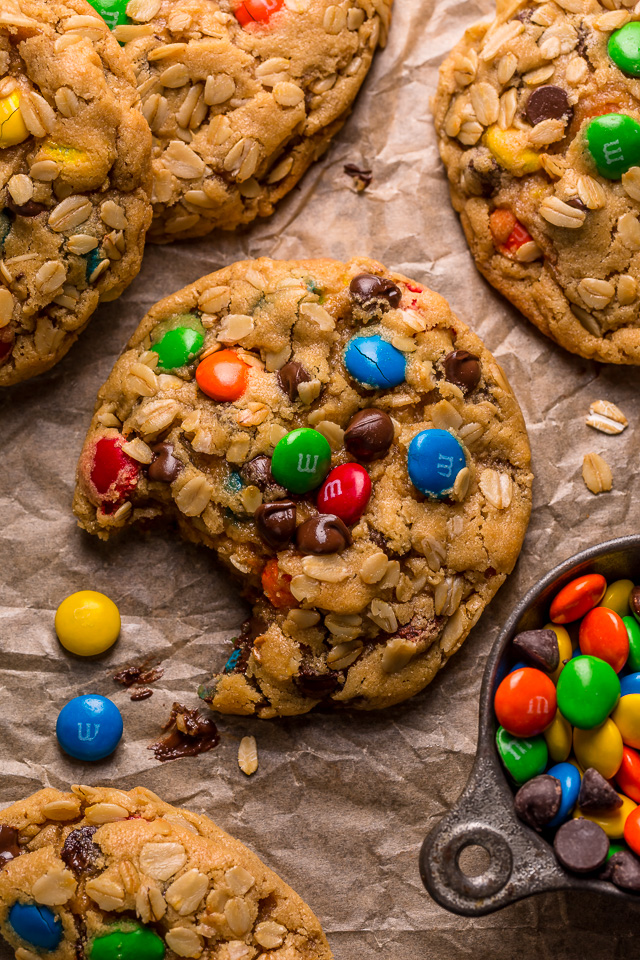 Monster cookies are loaded with creamy peanut butter, chewy oats, colorful m&ms, and gooey chocolate chips! They bake up super thick, with chewy edges and incredibly soft centers. A must try for all of my fellow cookie monsters out there!