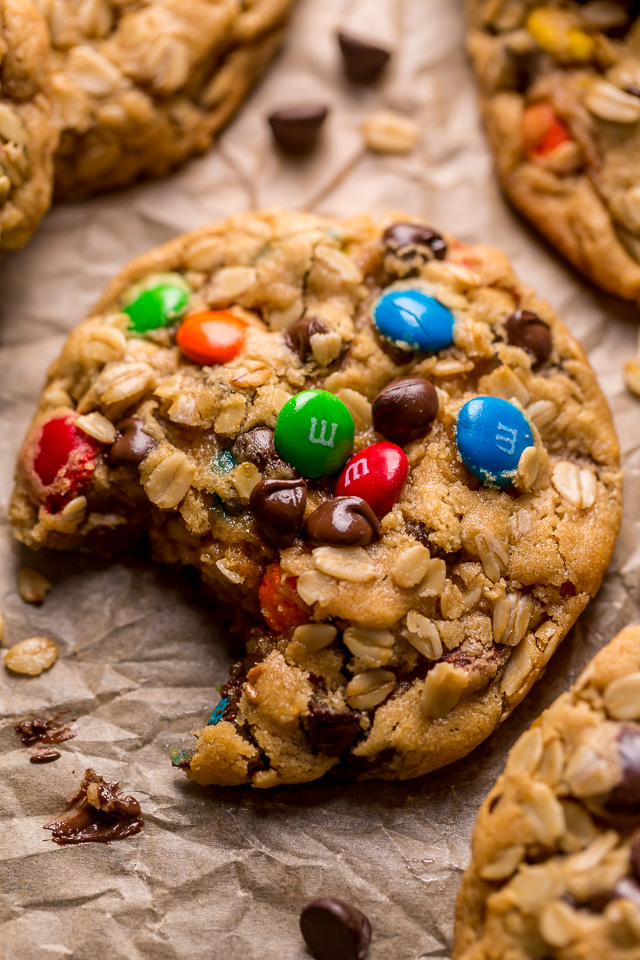 Monster cookies are loaded with creamy peanut butter, chewy oats, colorful m&ms, and gooey chocolate chips! They bake up super thick, with chewy edges and incredibly soft centers. A must try for all of my fellow cookie monsters out there!