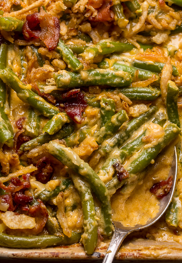 Cheesy Bacon and Green Bean Casserole is creamy, crunchy, and so delicious! Always a huge hit at Thanksgiving celebrations, parties, and pot lucks! If you've been looking for a new green bean casserole recipe, this is it!