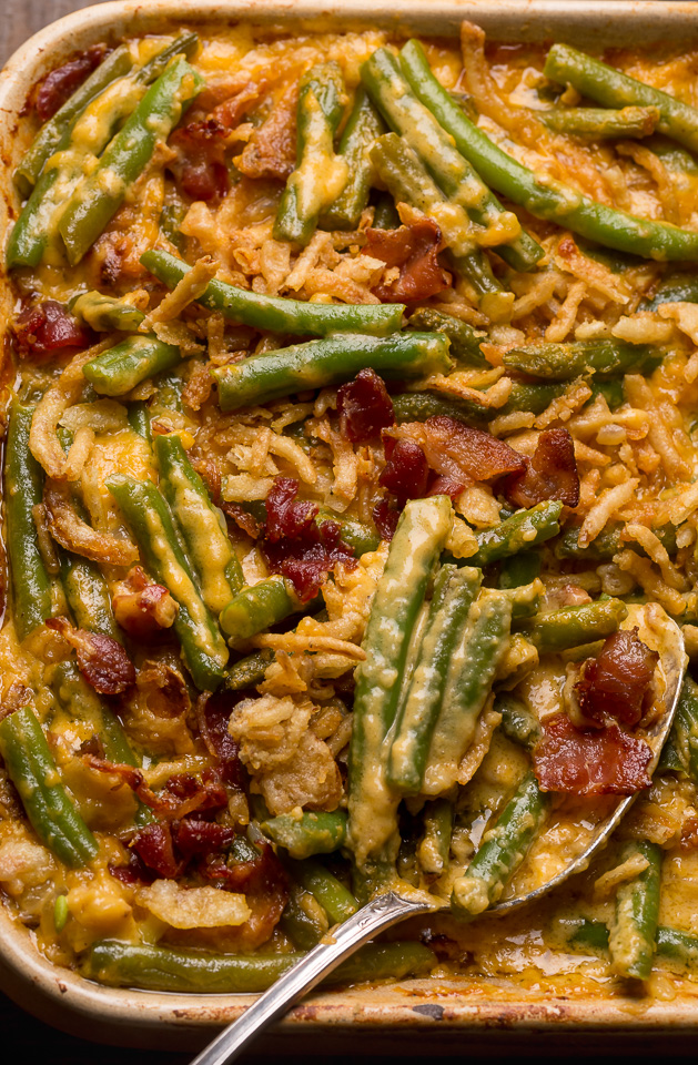 Cheesy Bacon and Green Bean Casserole is creamy, crunchy, and so delicious! Always a huge hit at Thanksgiving celebrations, parties, and pot lucks! If you've been looking for a new green bean casserole recipe, this is it!