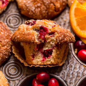 These festive Cranberry Orange Muffins feature fresh cranberries, fresh orange juice, and a touch of orange zest! Frozen cranberries can be used, but I don't suggest using dried cranberries. Bust out your muffin pan and treat yourself to a batch today!