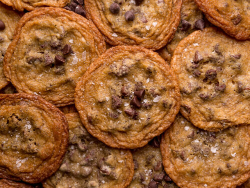 https://bakerbynature.com/wp-content/uploads/2020/11/Thin-Crispy-Chocolate-Chip-Cookies-1-of-1-500x375.jpg