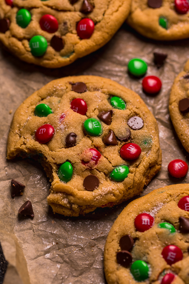 Santa's Favorite Peanut Butter M&M Cookies are thick, soft, and chewy! These GIANT bakery-style holiday cookies are loaded with peanut butter, M&Ms, and gooey milk chocolate chips! A crowd-pleasing cookie recipe that's loved equally by kiddos and adults!