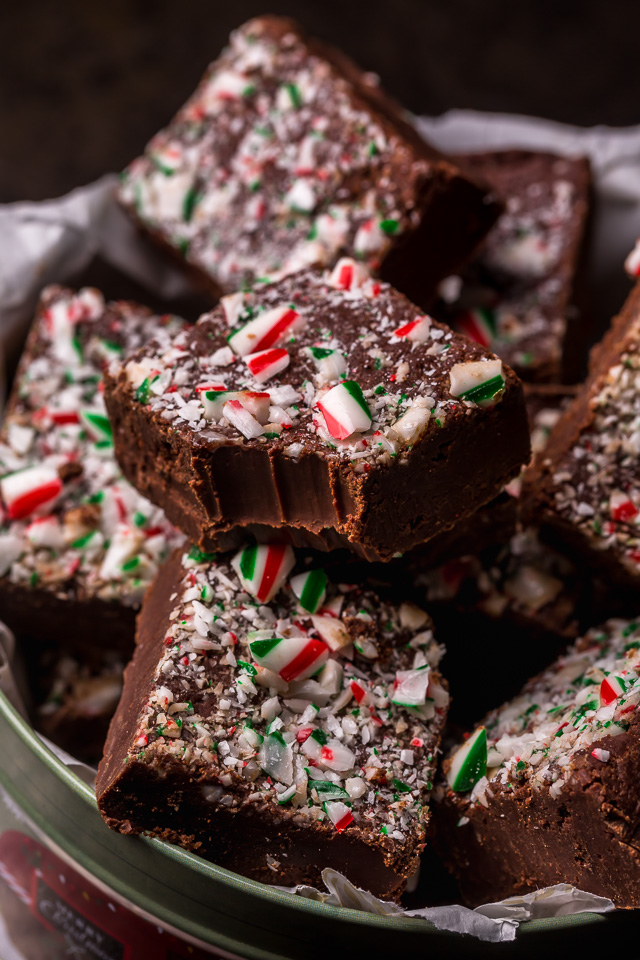 This EASY Chocolate Peppermint Fudge Recipe is rich, creamy, and topped with crunchy crushed candy canes! If you love the combination of chocolate and peppermint, you're going to love this fudge! And it makes a great holiday gift for friends and family!