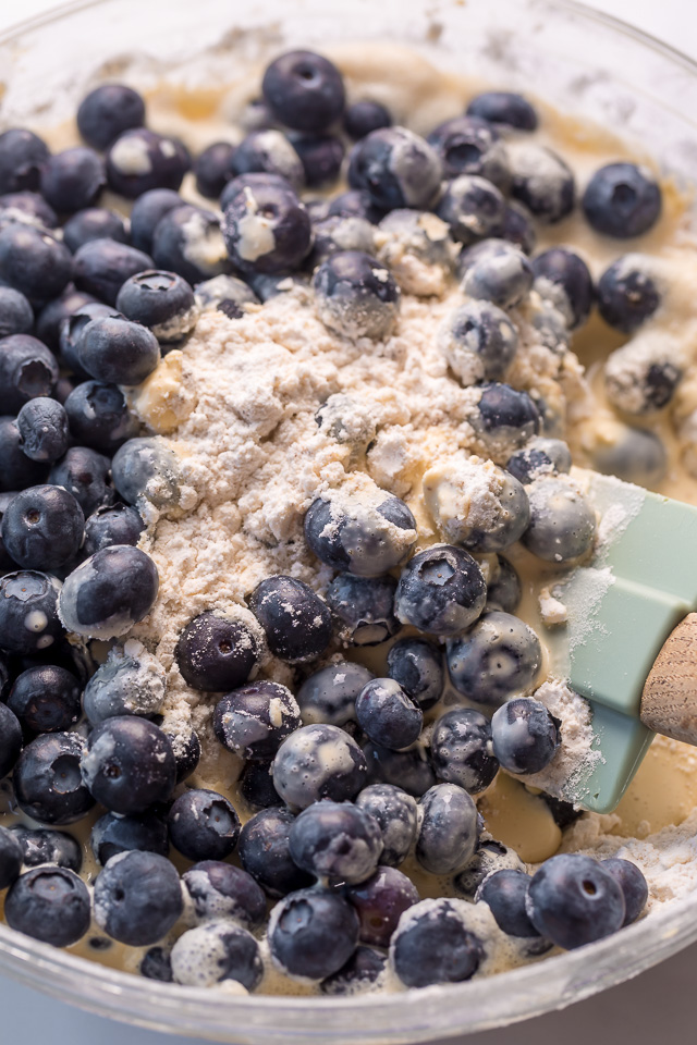 These Classic Bakery-Style Blueberry Scones are sweet, buttery, and exploding with fresh blueberries! Topped with sparkling coarse sugar and a sweet vanilla glaze, these are perfect for breakfast or brunch! Even scone haters love this recipe!