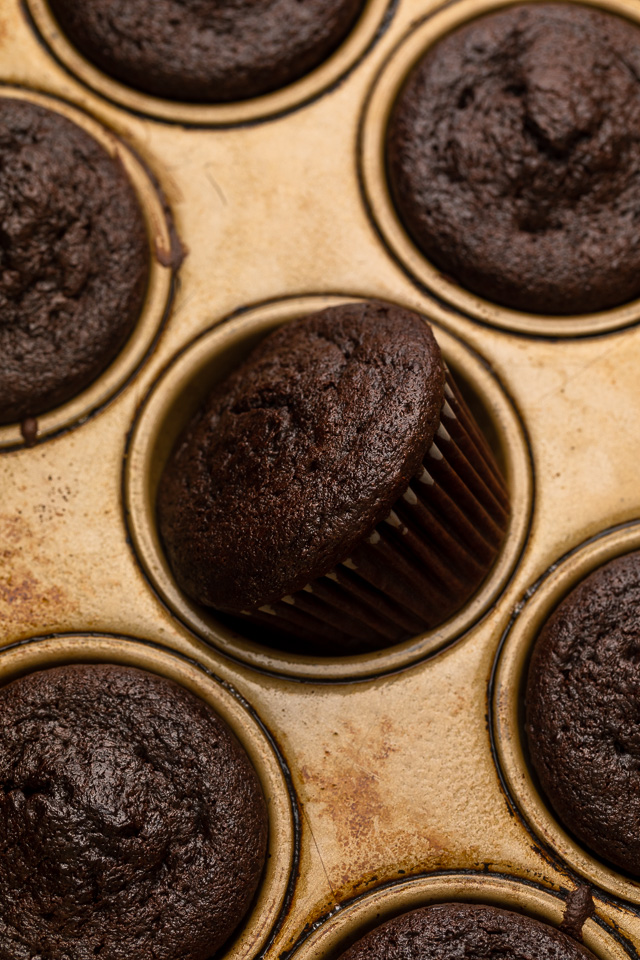 The Best Brooklyn Blackout Cupcakes are insanely moist, filled with chocolate pudding, and topped with fudgy chocolate frosting and chocolate cake crumbs! Just like Brooklyn Blackout Cake... but in cupcake form! These require a little advance planning, but are sure to be a showstopper at your next event!