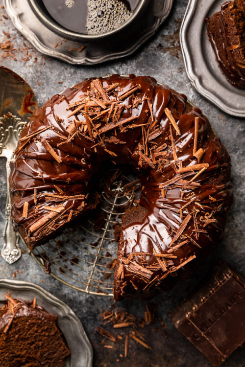 This Super Moist Chocolate Bundt Cake is always a crowd-pleaser! Loaded with rich chocolate flavor and covered in decedent chocolate ganache and shaved chocolate curls, this one is definitely a dessert for chocolate lovers only. So much easier than making a layer cake!
