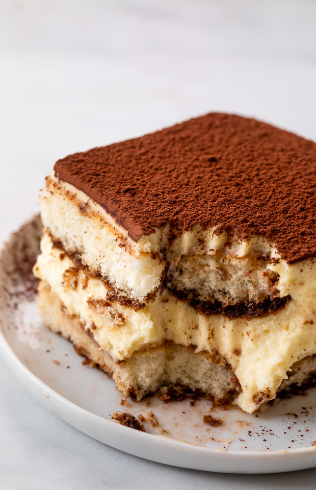 This Classic Italian Tiramisu for a Crowd is always a hit! Made with a creamy mascarpone mixture, coffee soaked ladyfingers, and a dusting of dark cocoa powder, this is heaven in a baking dish! No raw eggs in this recipe!