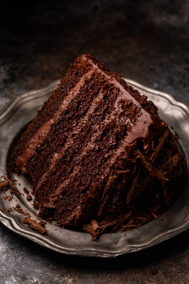 If you love chocolate cake, you have to try this sinfully delicious recipe for Devil's Food Cake! It's an old-fashioned recipe that's intensely rich, moist yet dense, and totally decadent! Exploding with rich chocolate flavor and covered in chocolate frosting, it's sure to become your favorite chocolate cake recipe!