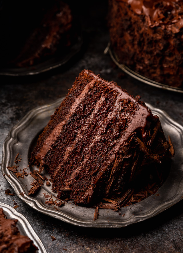If you love chocolate cake, you have to try this sinfully delicious recipe for Devil's Food Cake! It's an old-fashioned recipe that's intensely rich, moist yet dense, and totally decadent! Exploding with rich chocolate flavor and covered in chocolate frosting, it's sure to become your favorite chocolate cake recipe!