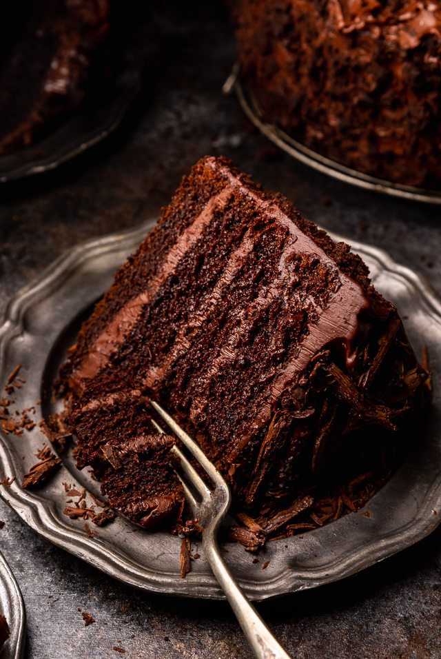 If you love chocolate cake, you have to try this sinfully delicious recipe for Devil's Food Cake! It's an old-fashioned recipe that's intensely rich, moist yet dense, and totally decadent! Exploding with rich chocolate flavor and covered in chocolate frosting, it's sure to become your favorite chocolate cake recipe!