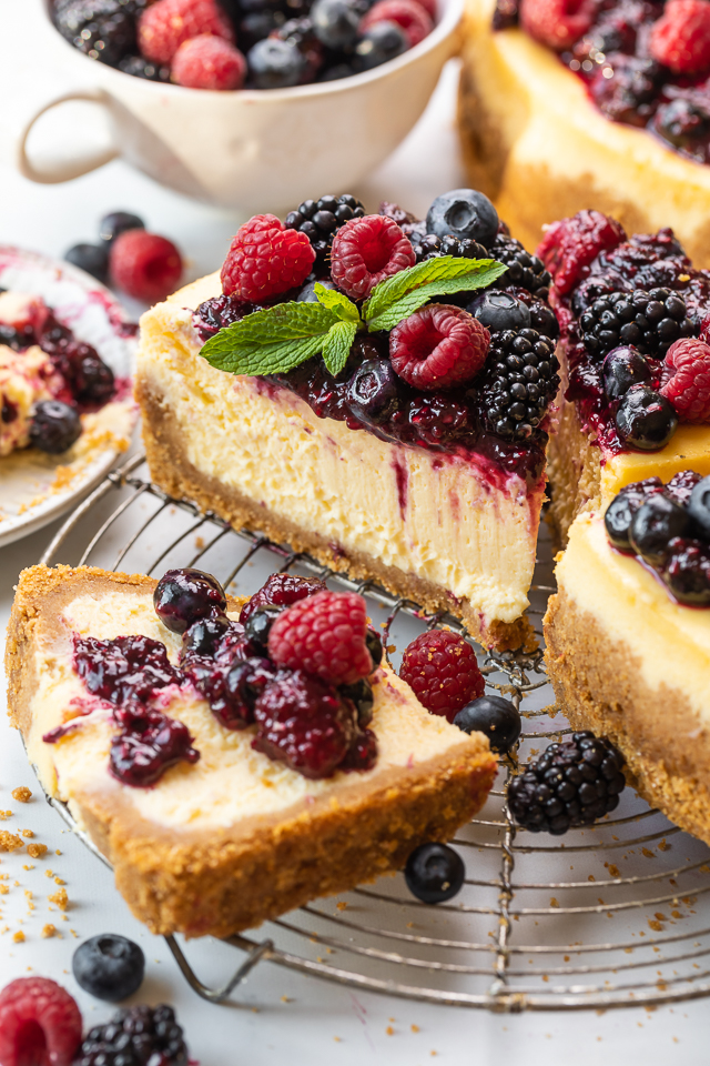 One of my favorite Easter traditions is baking a creamy ricotta cheesecake for my family! It's the perfect recipe to share with a crowd, and it's make-ahead friendly, meaning you can bake it well in advance and just pull it out of the freezer the night before you plan on serving it! Delicious on it's own, but outrageously good with a fresh berry sauce on top!