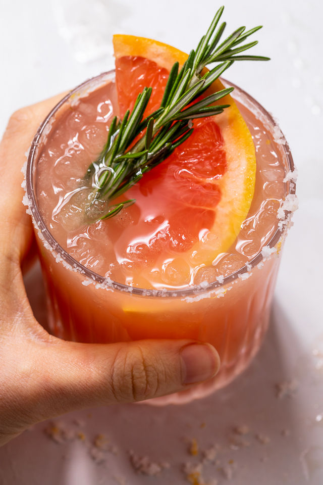 Made with gin or vodka and grapefruit juice, this classic cocktail is so easy and always a crowd-pleaser! Served in a highball glass with a salted rim, this drink is perfect for brunch or Summer parties! Just be sure to use fresh grapefruit juice, it really makes all the difference!