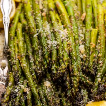 This Lemon Garlic Parmesan Asparagus is a quick and easy side dish that's ready in less than 20 minutes! Perfect with grilled meat, seafood, or a ball of burrata and some charred bread! No matter what you serve it with, I just know you're going to love this recipe!