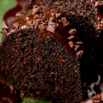 This Chocolate Zucchini Bundt Cake is insanely moist, so fudgy, and loaded with chocolate flavor! No one will even know there's 2 whole cups of shredded zucchini hiding inside! Delicious with chocolate glaze, but can easily be served with whipped cream or a dusting of powdered sugar instead!