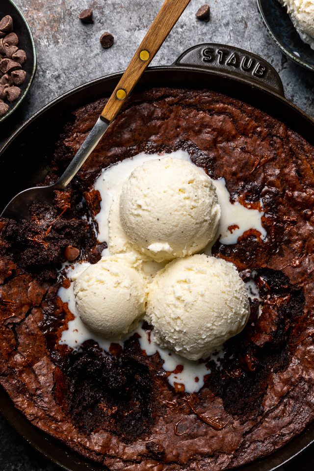 These Easy Skillet Brownies are gooey, fudgy, and so decadent! Made with cocoa powder, melted chocolate, and chocolate chips, these fudgy brownies are definitely for chocolate lovers only! Serve warm, with a few giant scoops of vanilla ice cream on top!