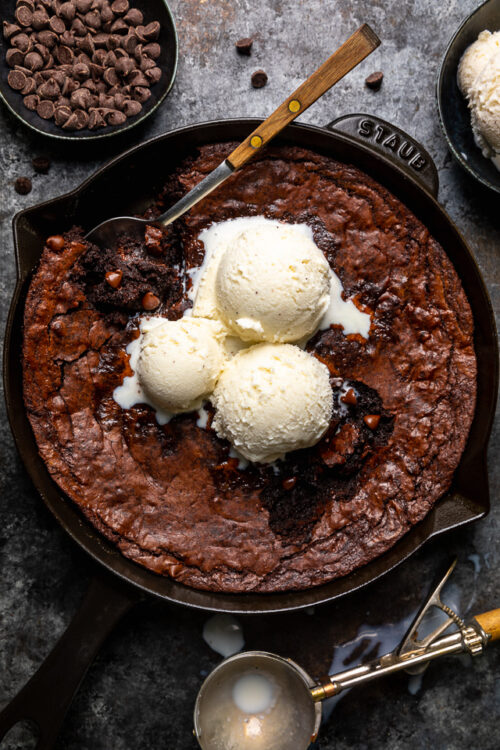 These Easy Skillet Brownies are gooey, fudgy, and so decadent! Made with cocoa powder, melted chocolate, and chocolate chips, these fudgy brownies are definitely for chocolate lovers only! Serve warm, with a few giant scoops of vanilla ice cream on top!