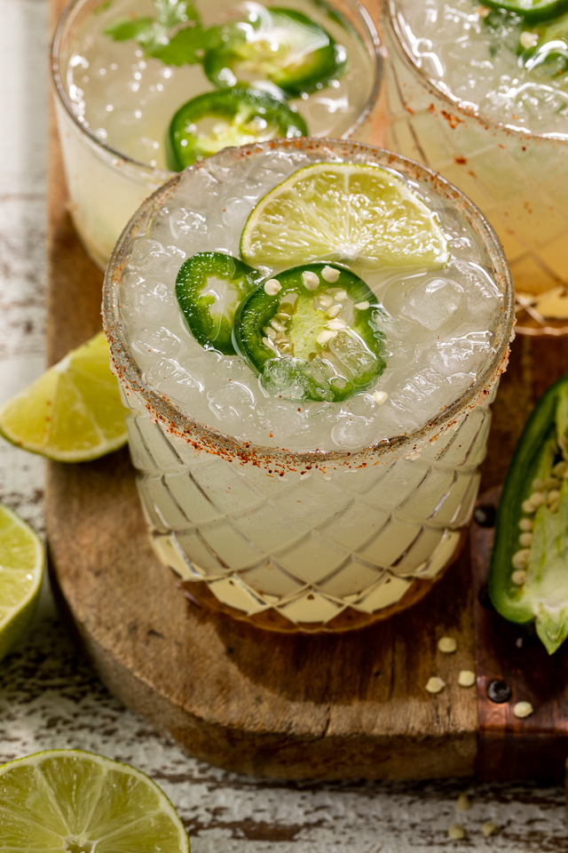 Say hello to the BEST Spicy Jalapeno Margarita your lips will ever meet! It's everything you love about a classic margarita, but with a spicy kick! Feel free to double the spice if you really want to suffer, or reduce it for a more mild marg!