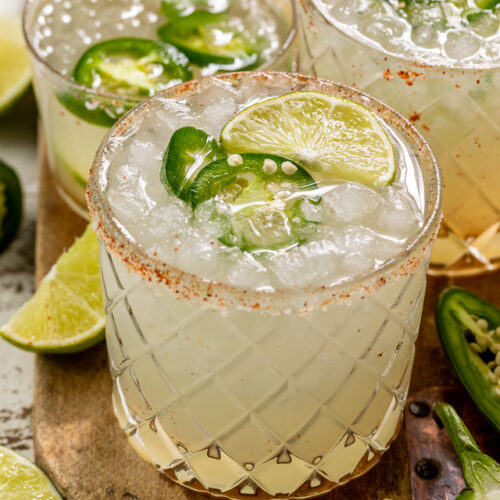 Say hello to the BEST Spicy Jalapeno Margarita your lips will ever meet! It's everything you love about a classic margarita, but with a spicy kick! Feel free to double the spice if you really want to suffer, or reduce it for a more mild marg!