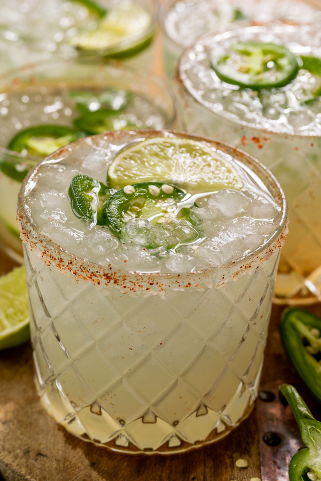 Say hello to the BEST Spicy Jalapeno Margarita your lips will ever meet! It's everything you love about a classic margarita, but with a spicy kick! Feel free to double the spice if you really want to suffer, or reduce it for a more mild marg!
