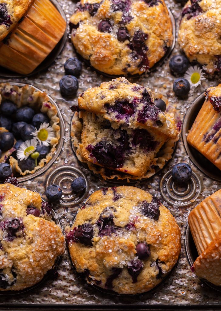 Not too sweet and delightfully moist, these Banana Blueberry Muffins are the perfect breakfast treat! Fresh blueberries work best, but frozen blueberries will work in a pinch. Be sure to fill the muffin cups all the way up to the top for giant domed muffin tops!