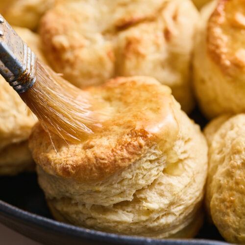 Flaky Golden Brown Buttermilk Biscuits are perfect for breakfast, brunch, or dinner! An easy crowd-pleasing recipe that will instantly become a favorite with your family! No food processor required!