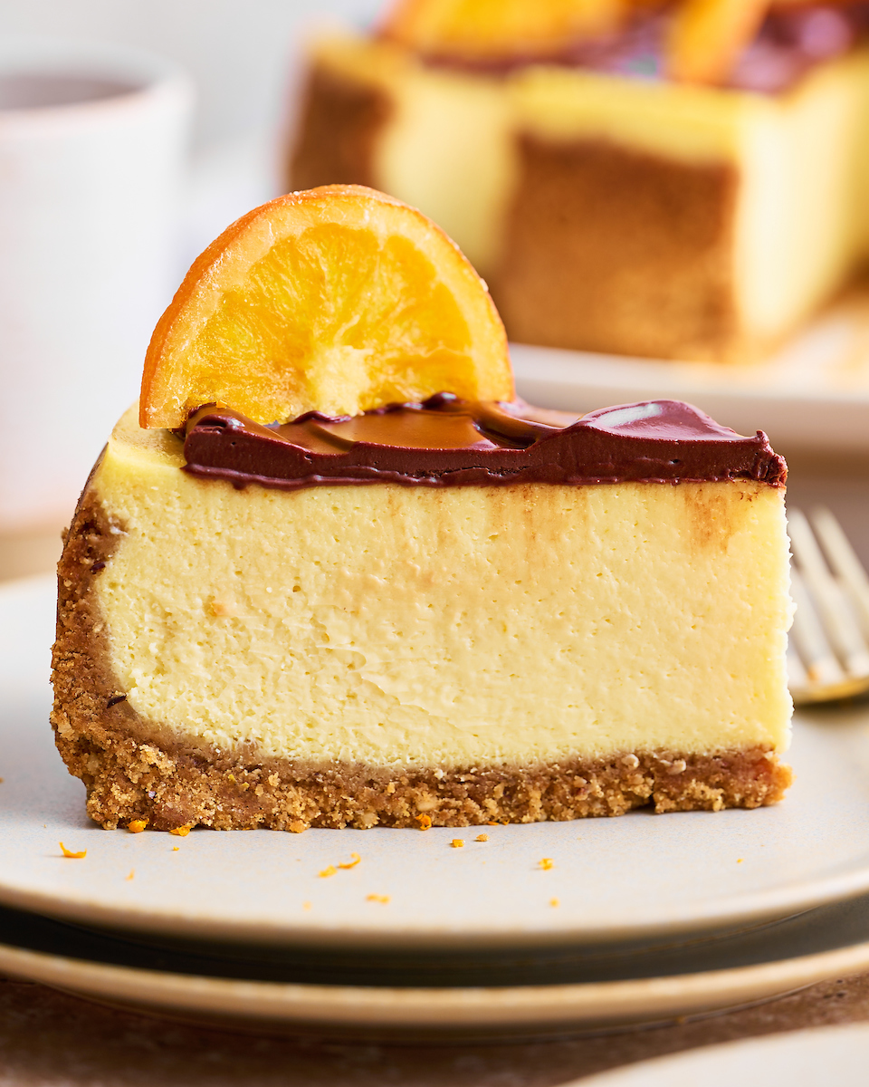 How stunning is this Orange Mascarpone Cheesecake with Chocolate Ganache?! Featuring a crunchy hazelnut graham cracker crust, creamy orange cheesecake filling, and silky smooth chocolate ganache, this recipe is a total showstopper! A must for anyone who loves the combination of chocolate and orange.